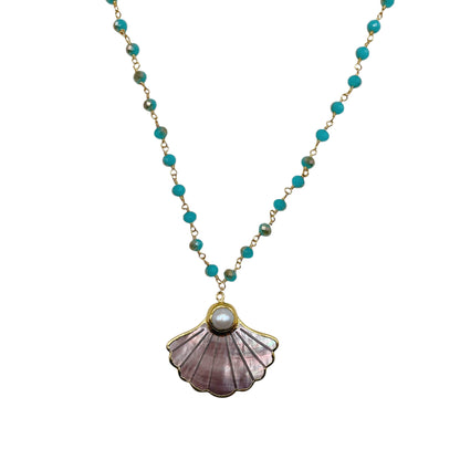 A gold-tone beaded necklace featuring turquoise blue beads and a scallop shell pendant with a central white pearl.